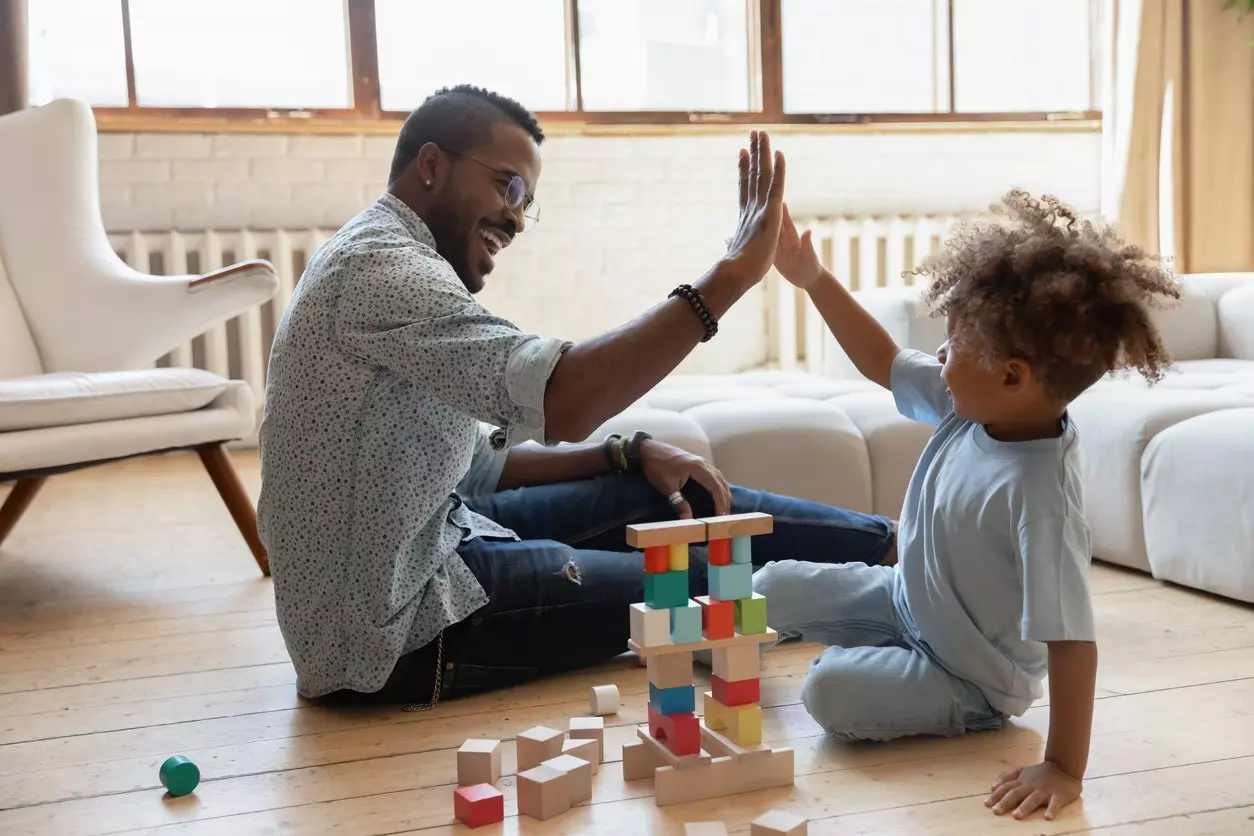 Dad and son building blocks