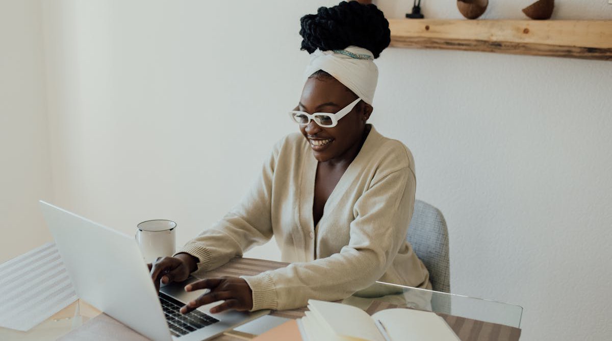 happy woman using a laptop