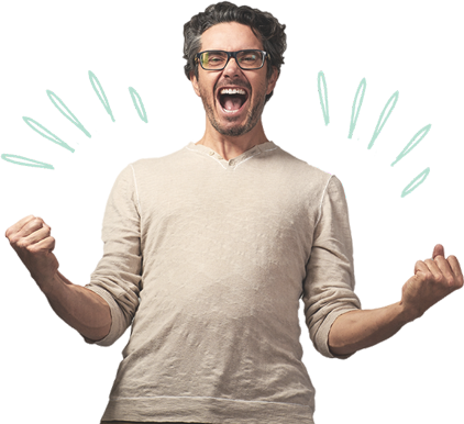 Excited smiling man making two fists wearing glasses and a beige t-shirt. 